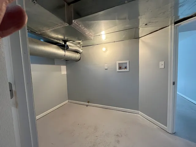 a view of a room with racks on the wall