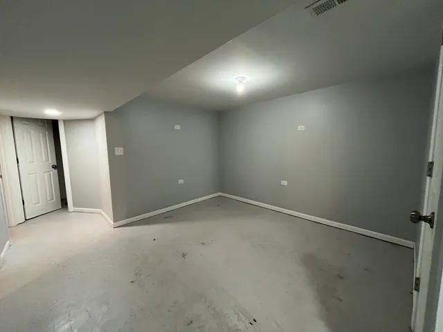 an empty room with an entryway