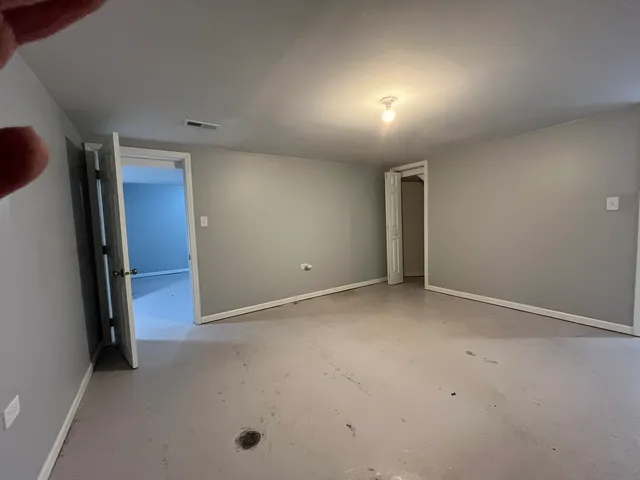 an empty room with windows