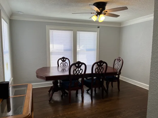 a view of a table and chairs in a room
