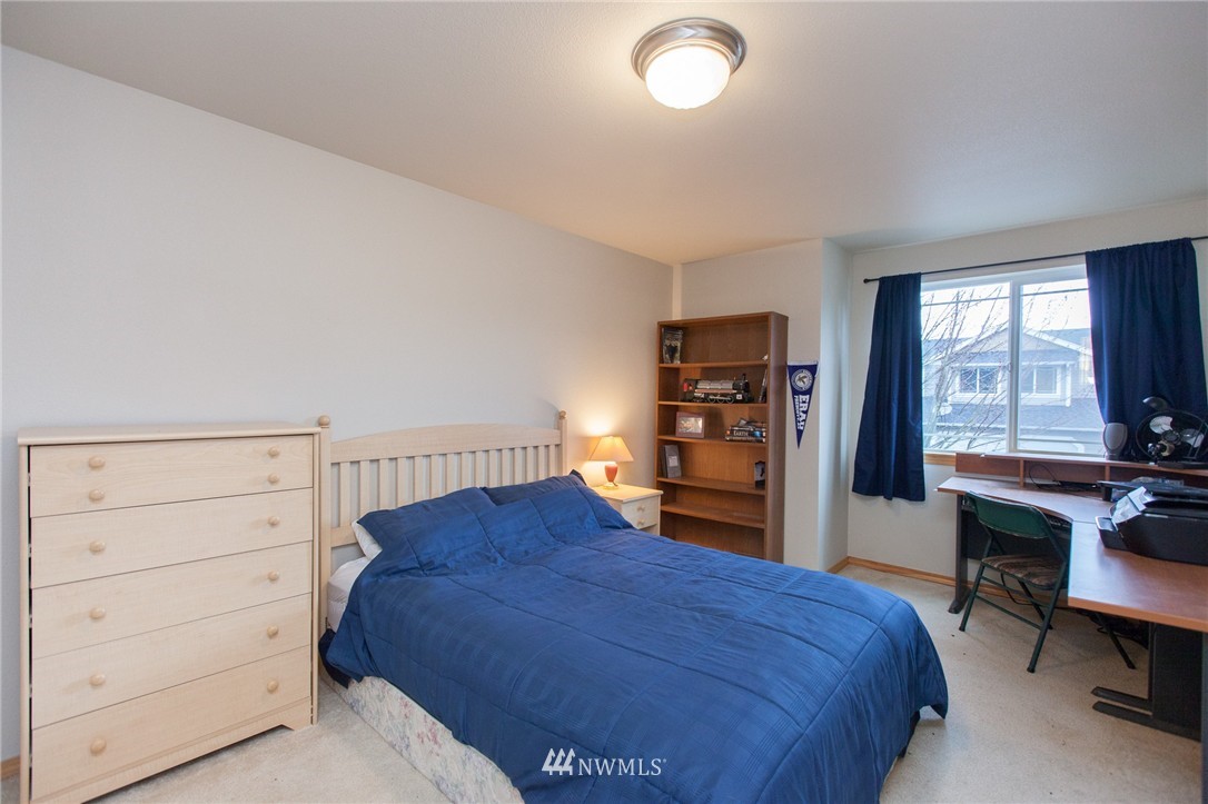 6745 Southeast 5th Street Renton, WA 98059 - Photo 19 of 25 a bed room with a bed and a window