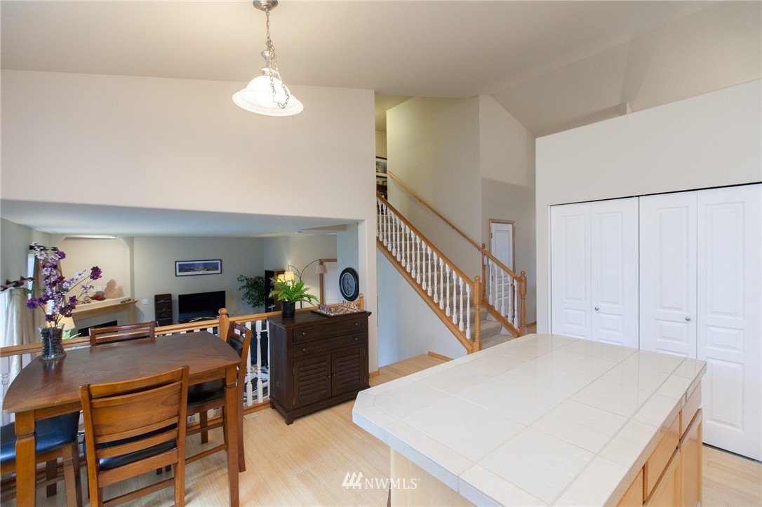 6745 Southeast 5th Street Renton, WA 98059 - Photo 6 of 25 a view of a livingroom with furniture window and wooden floor