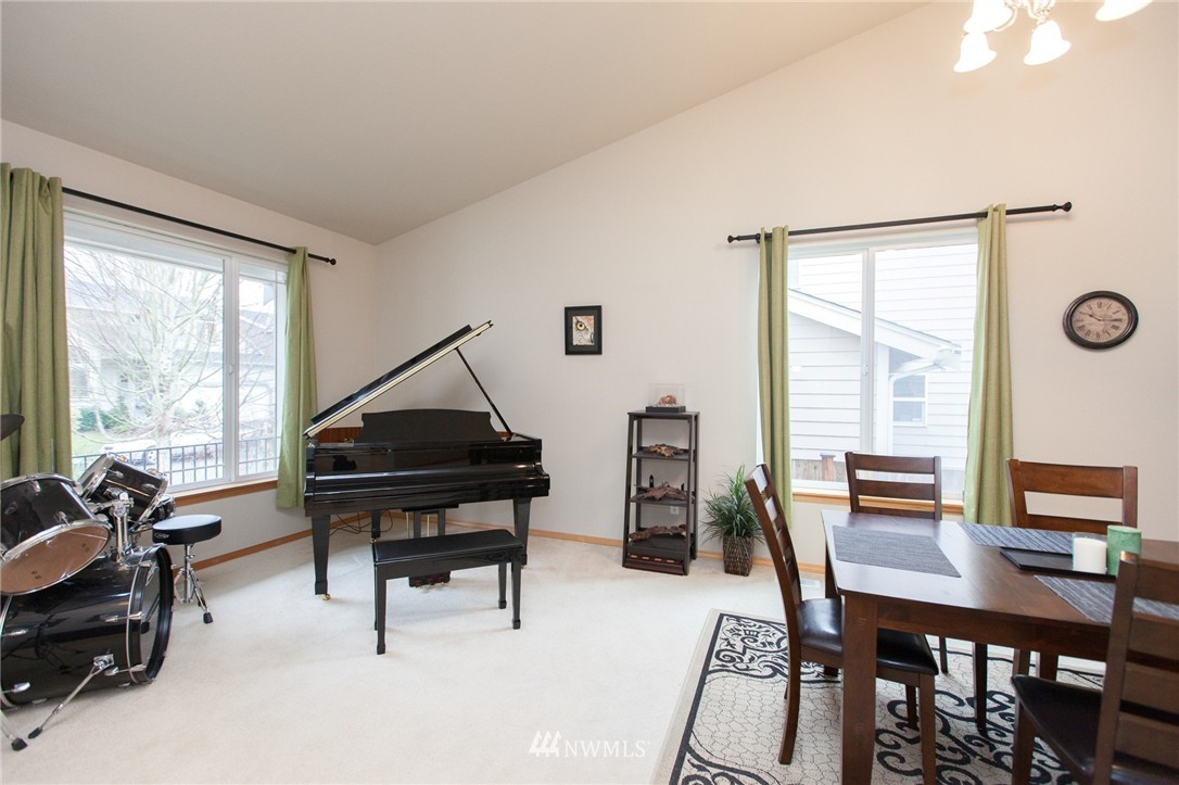 6745 Southeast 5th Street Renton, WA 98059 - Photo 10 of 25 a living room with furniture a window and a table