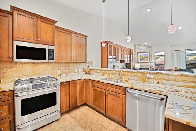 a bedroom with bed and wooden floor