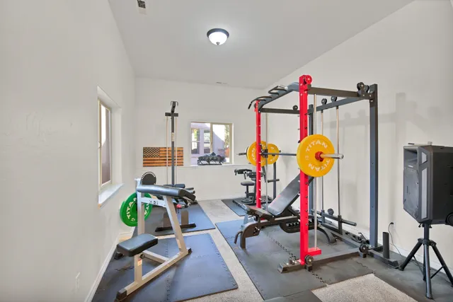 a bathroom with a sink vanity granite and a mirror