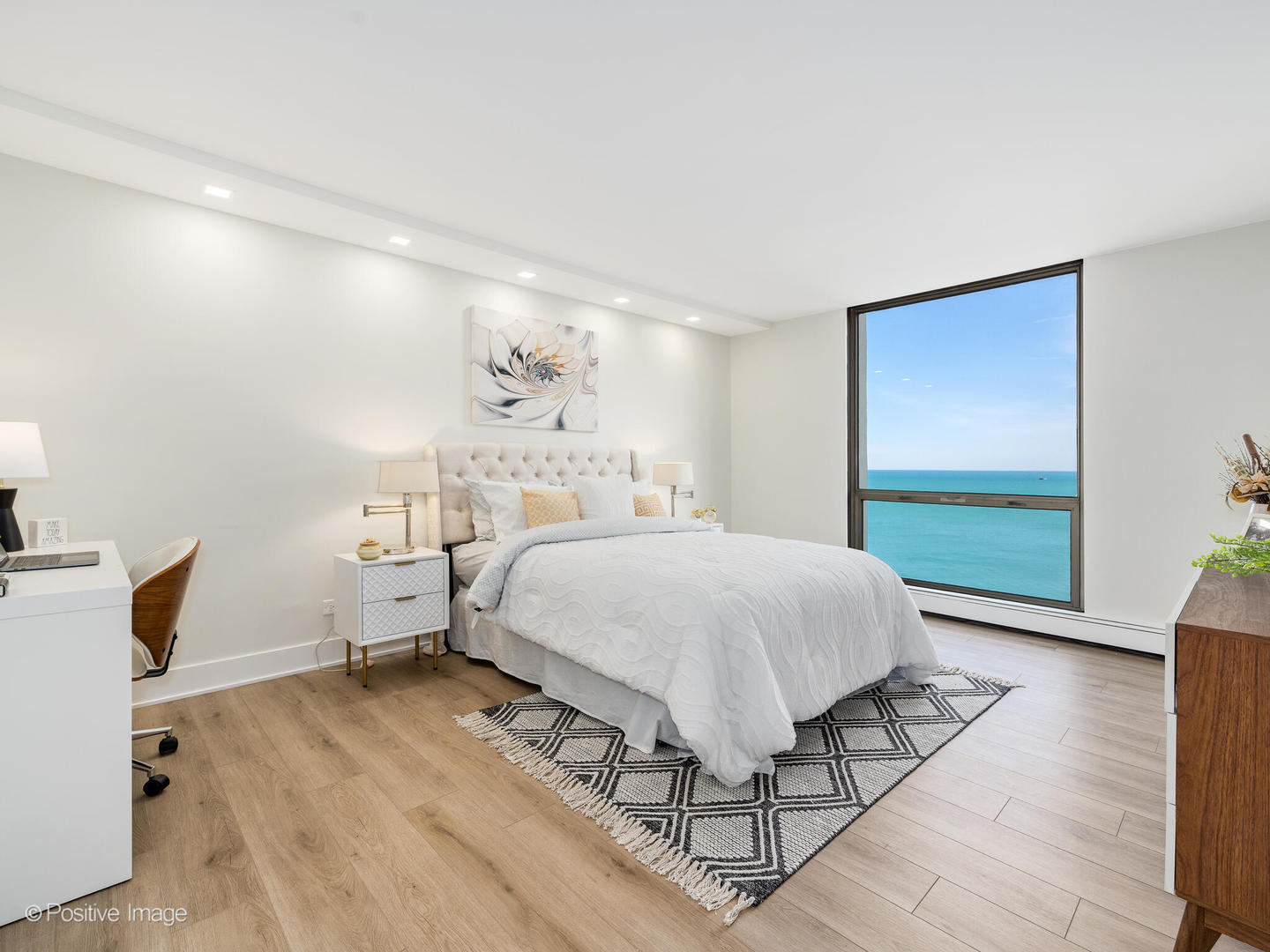 1310 North Ritchie Court, Unit 27C Chicago, IL 60610 - Photo 15 of 30 a spacious bedroom with a bed and a window