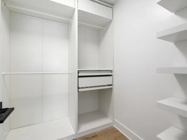 a bathroom with a close shower view