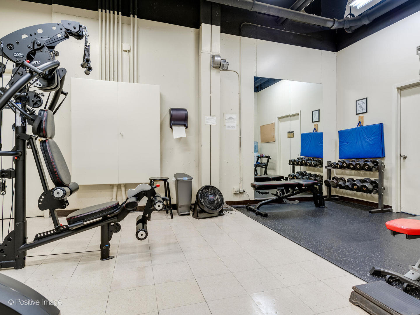 1310 North Ritchie Court, Unit 27C Chicago, IL 60610 - Photo 27 of 30 a view of a room with gym equipment