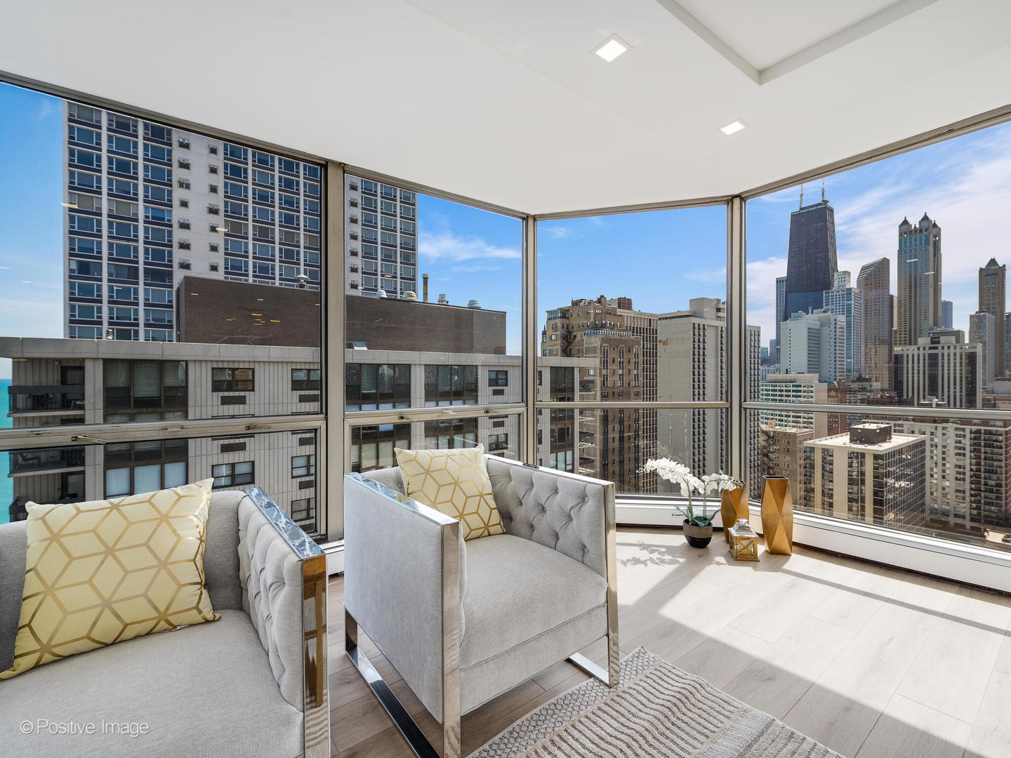 1310 North Ritchie Court, Unit 27C Chicago, IL 60610 - Photo 7 of 30 a living room with furniture and a large window