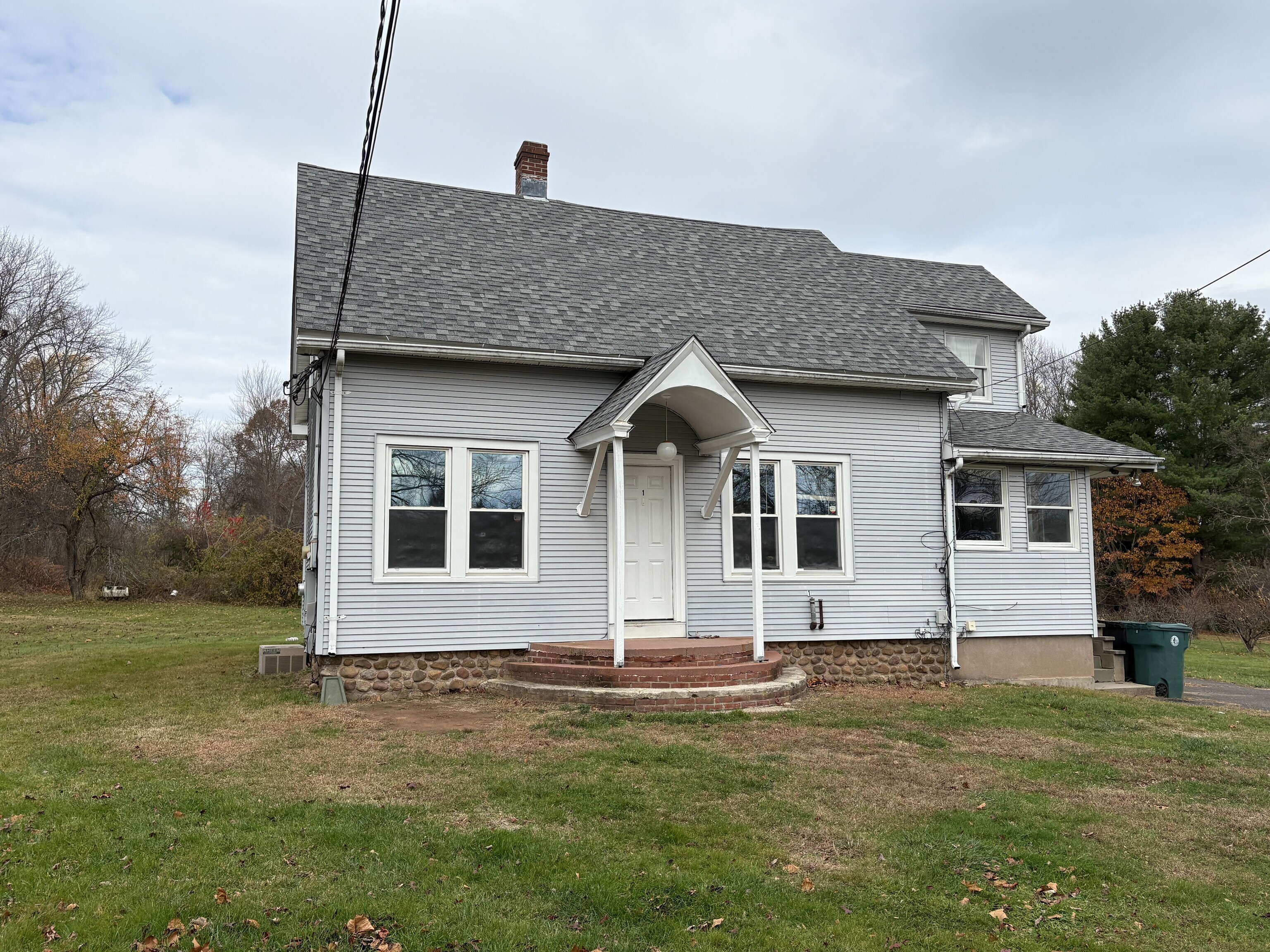 a front view of house with yard
