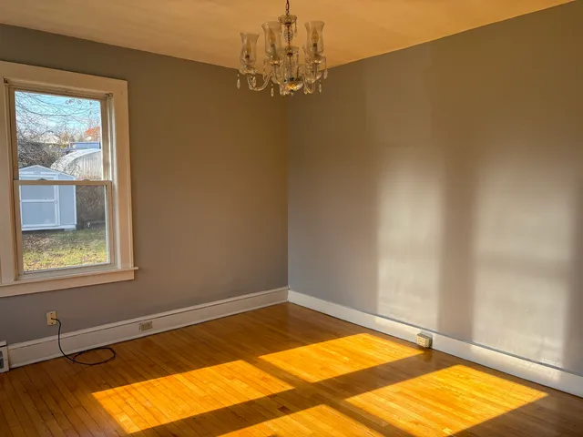 a view of a room with windows