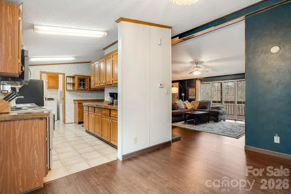 a bedroom with a bed and a ceiling fan