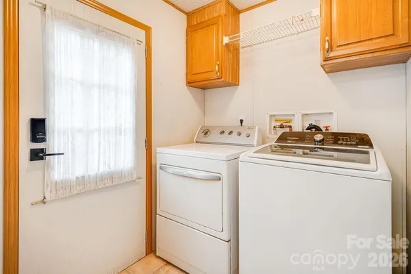 a view of a porch with wooden floor
