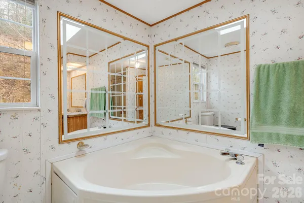 a view of a city with mountains in the background