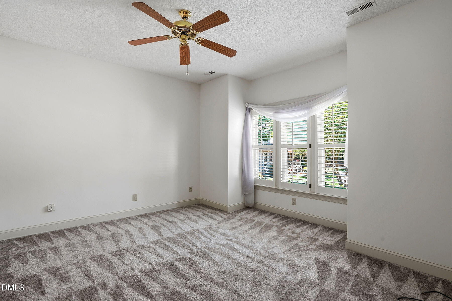 1210 Shadow Bark Court Raleigh, NC 27603 - Photo 6 of 29 a view of an empty room with a window