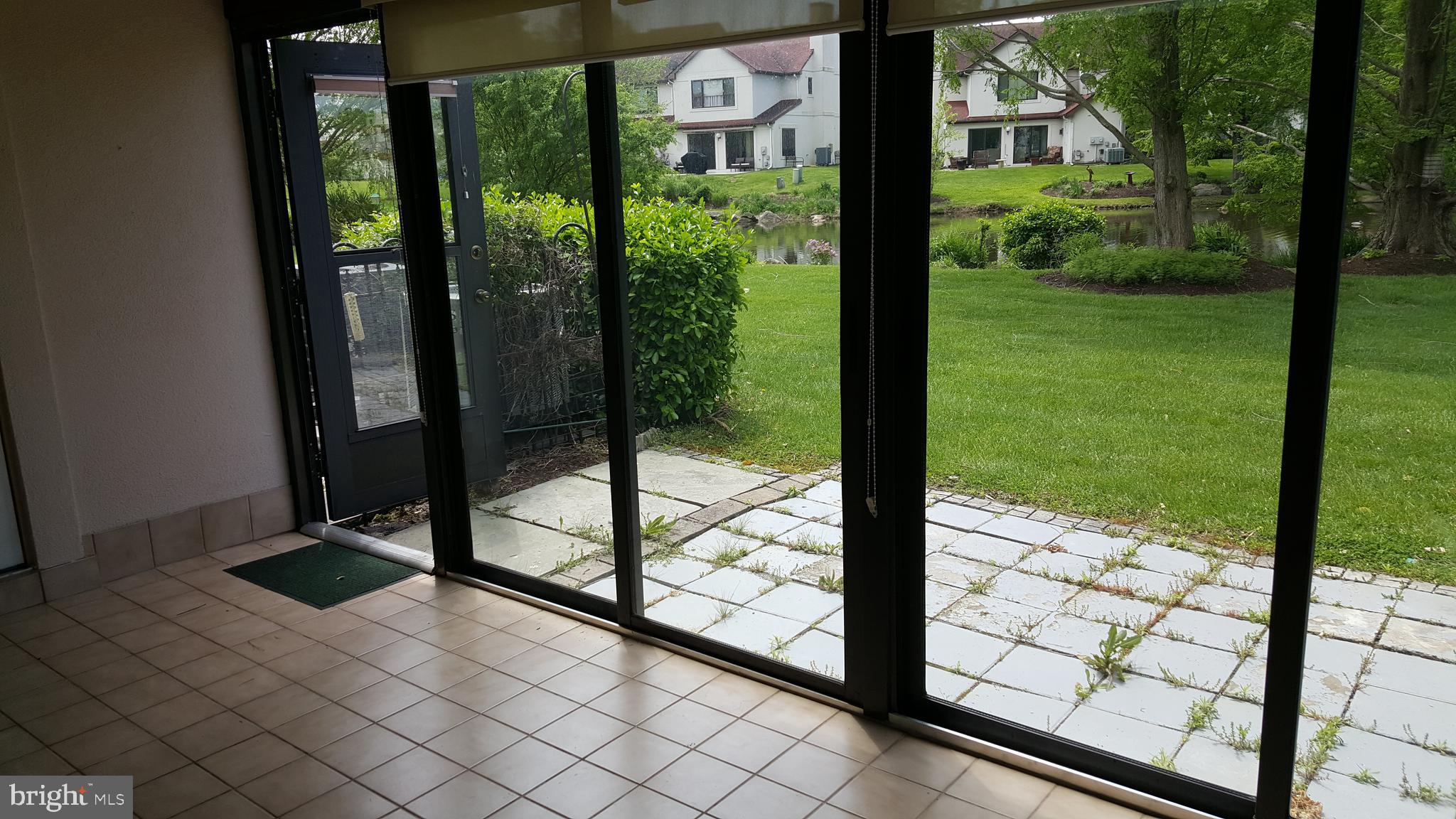 35 F Queen Anne Way Chester, MD 21619 - Photo 4 of 20 a view of a porch