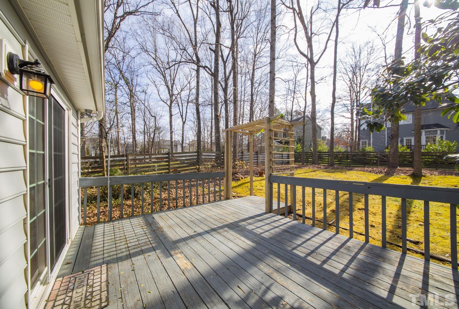 11805 North Exeter Way Raleigh, NC 27613 - Photo 18 of 19 a view of staircase with a trees