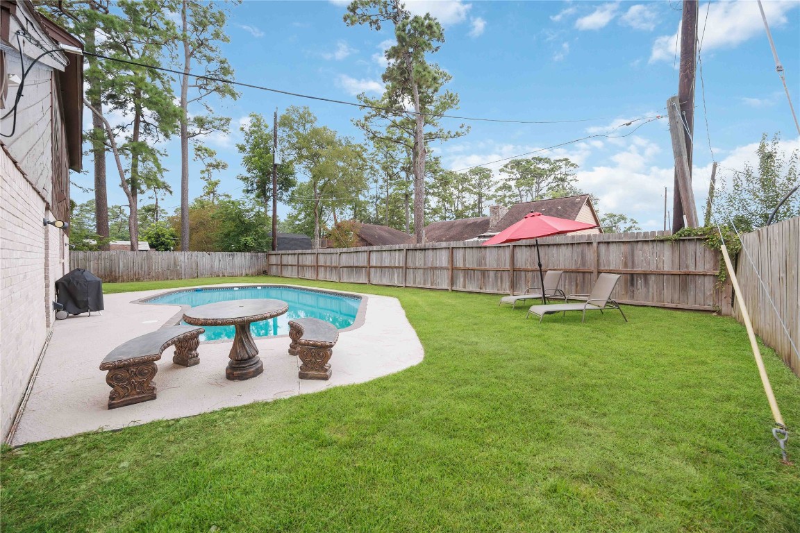 7310 Hickory Lane Baytown, TX 77521 - Photo 16 of 17 a view of a garden with a slide