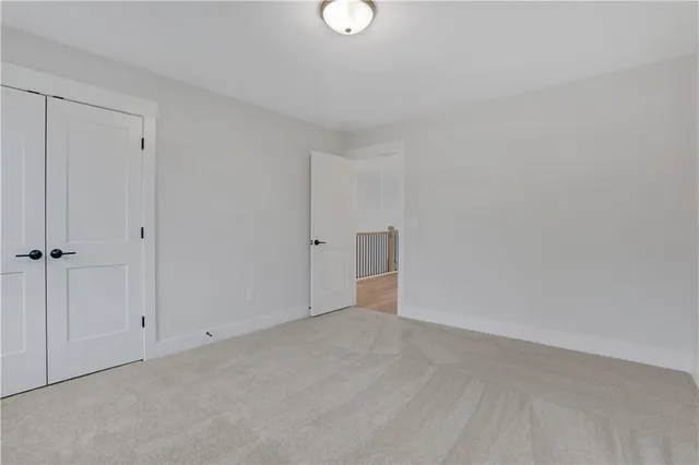 a view of a house with backyard