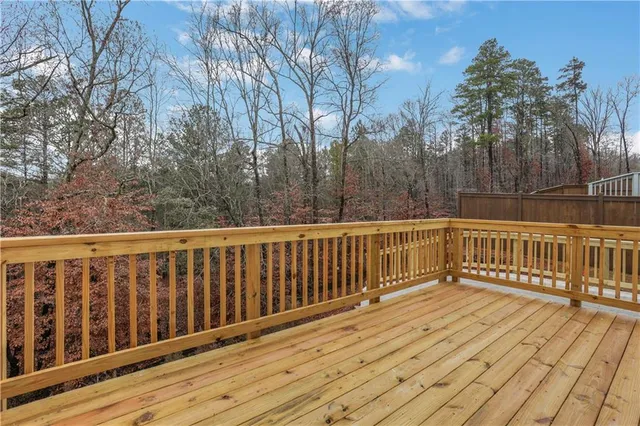 an aerial view of river residential houses with outdoor space and swimming pool