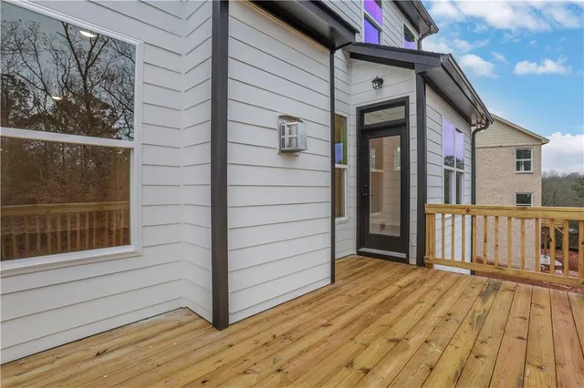 an aerial view of residential houses with outdoor space and river
