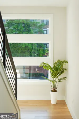a view of a porch with a potted plant