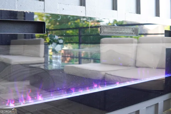 a table and chairs in a patio