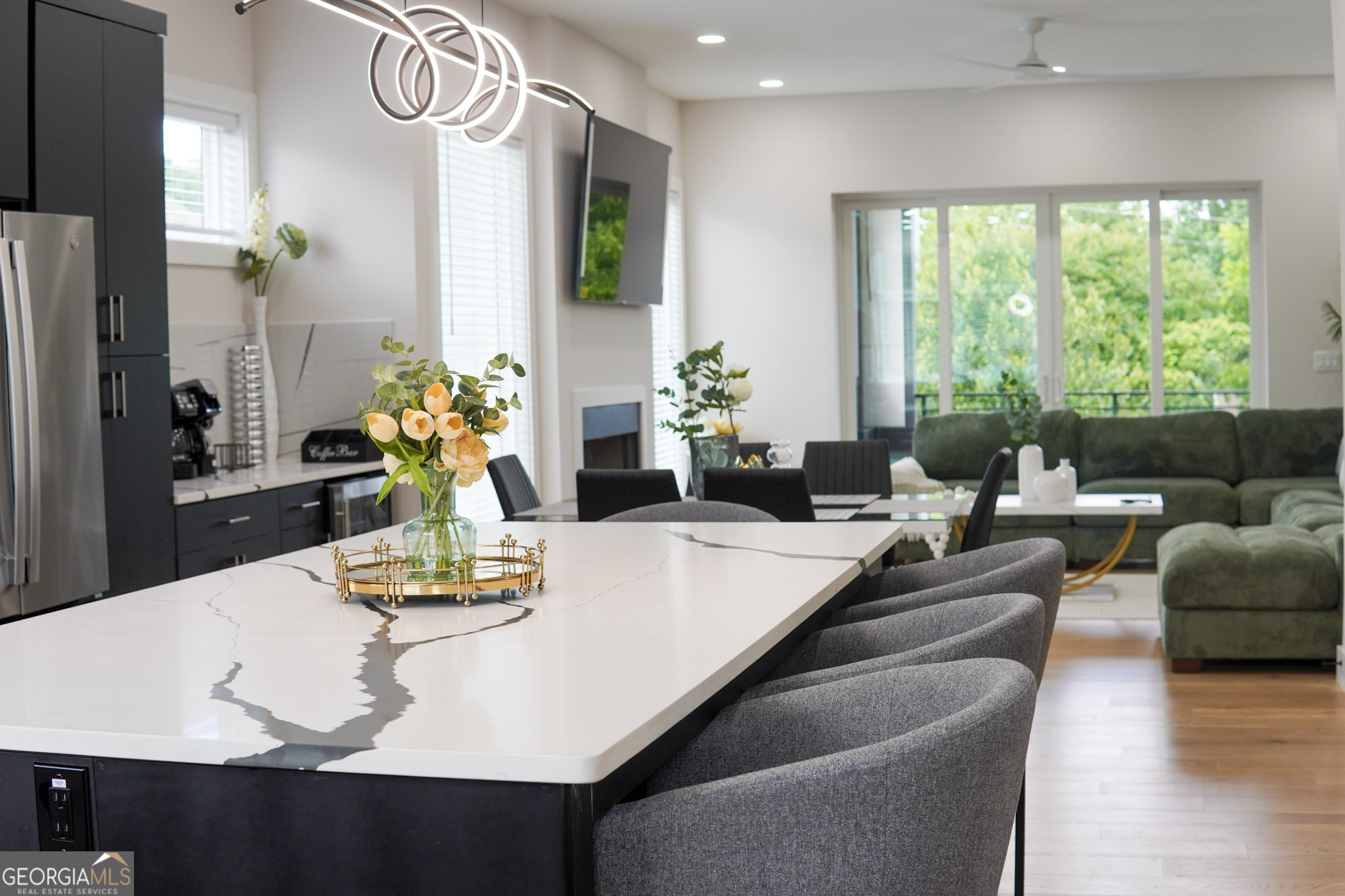 68 Boulevard Southeast Atlanta, GA 30312 - Photo 27 of 51 a dining room with furniture a large window and potted plants