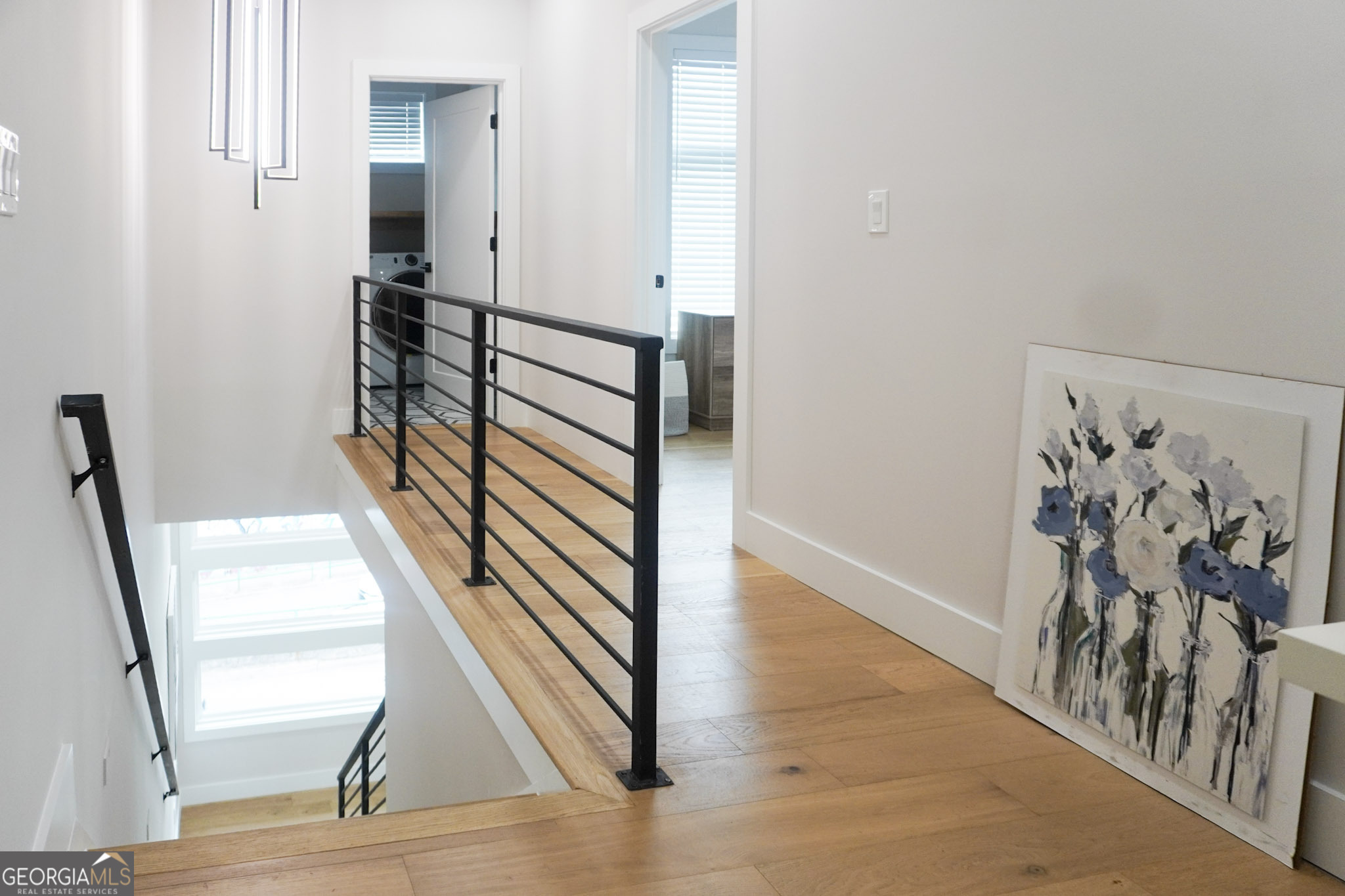 68 Boulevard Southeast Atlanta, GA 30312 - Photo 37 of 51 a view of a hallway with wooden floor and stairs