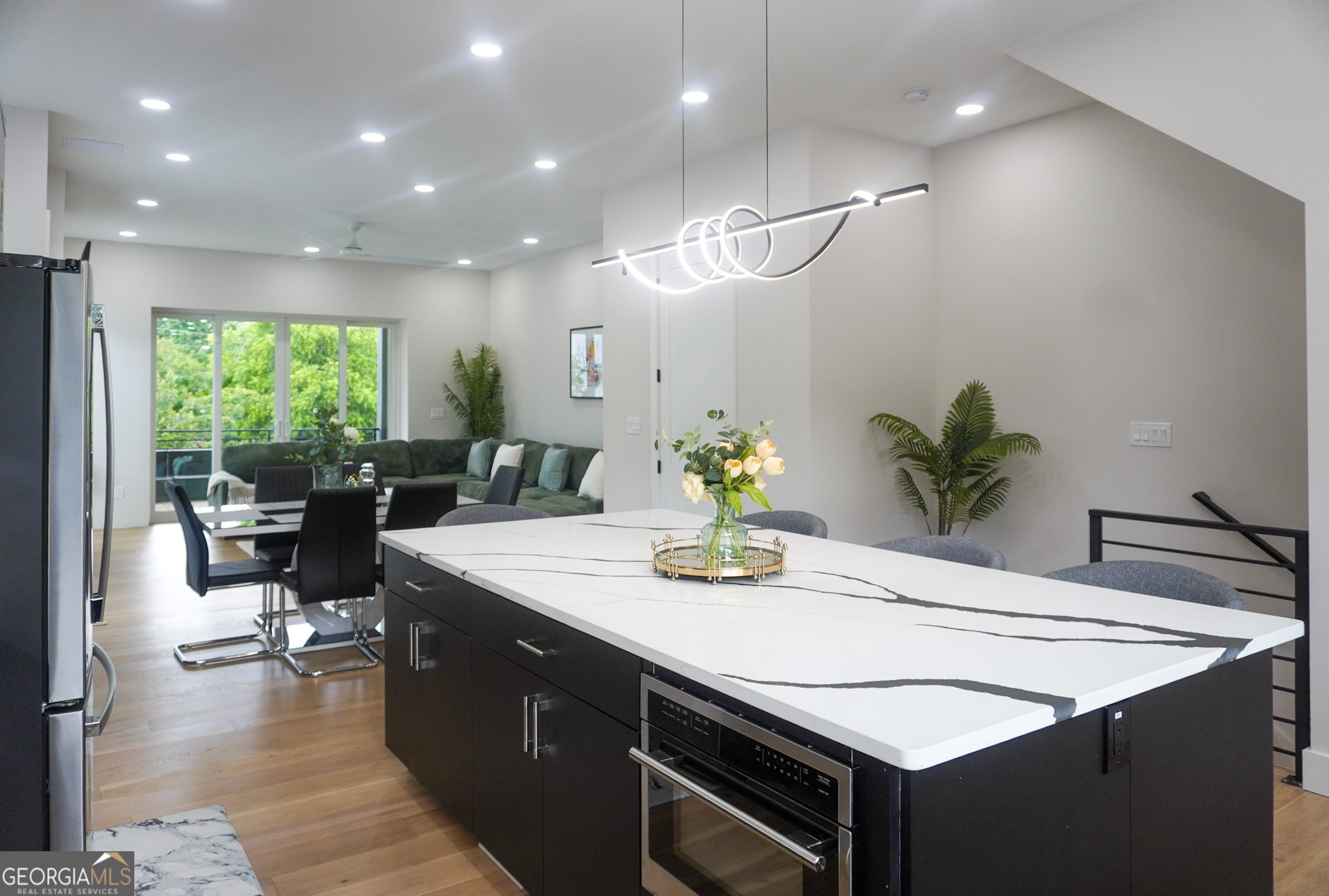 68 Boulevard Southeast Atlanta, GA 30312 - Photo 39 of 51 a kitchen with a sink a counter and chairs