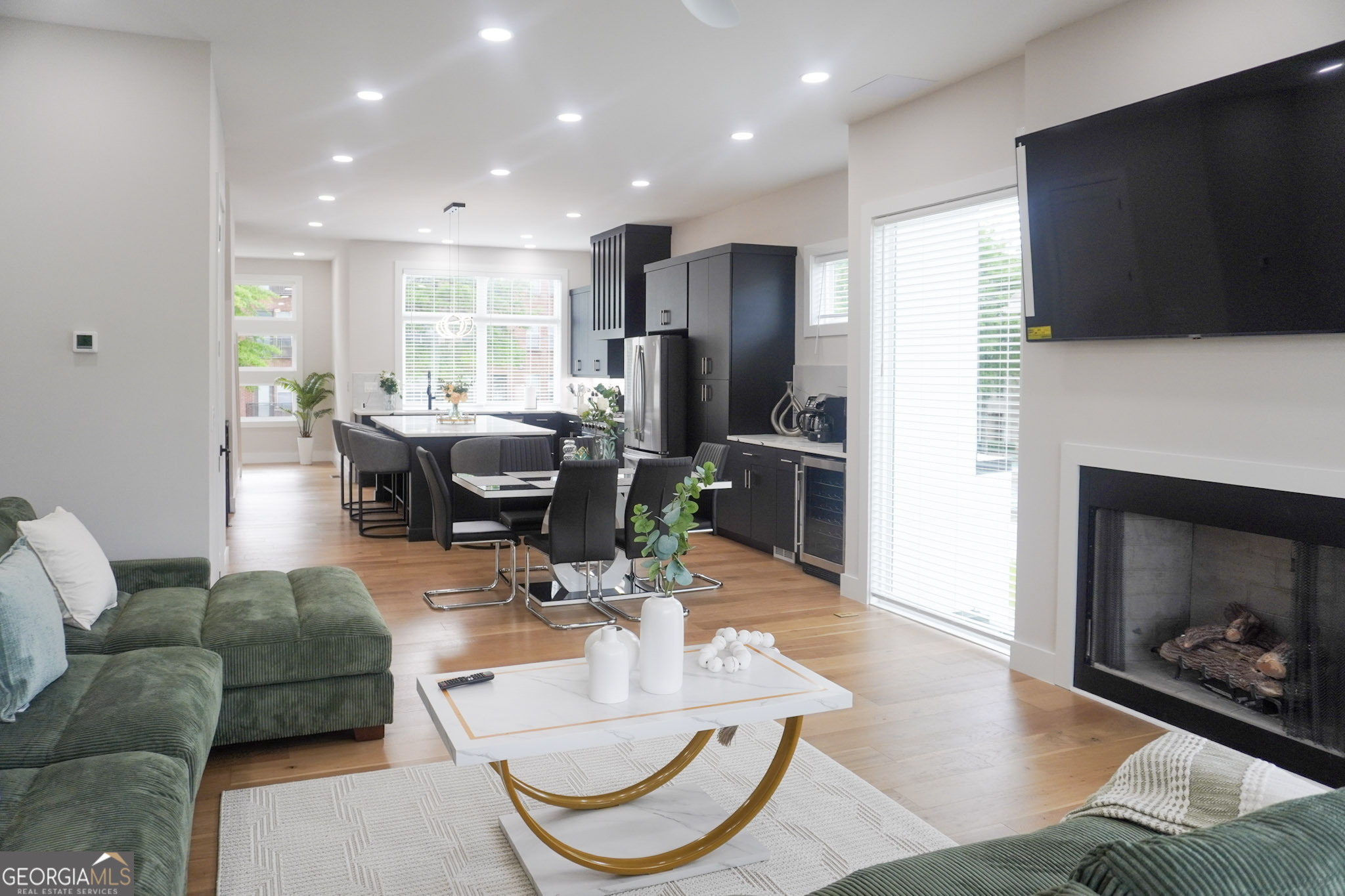 68 Boulevard Southeast Atlanta, GA 30312 - Photo 41 of 51 a living room with fireplace furniture and a flat screen tv