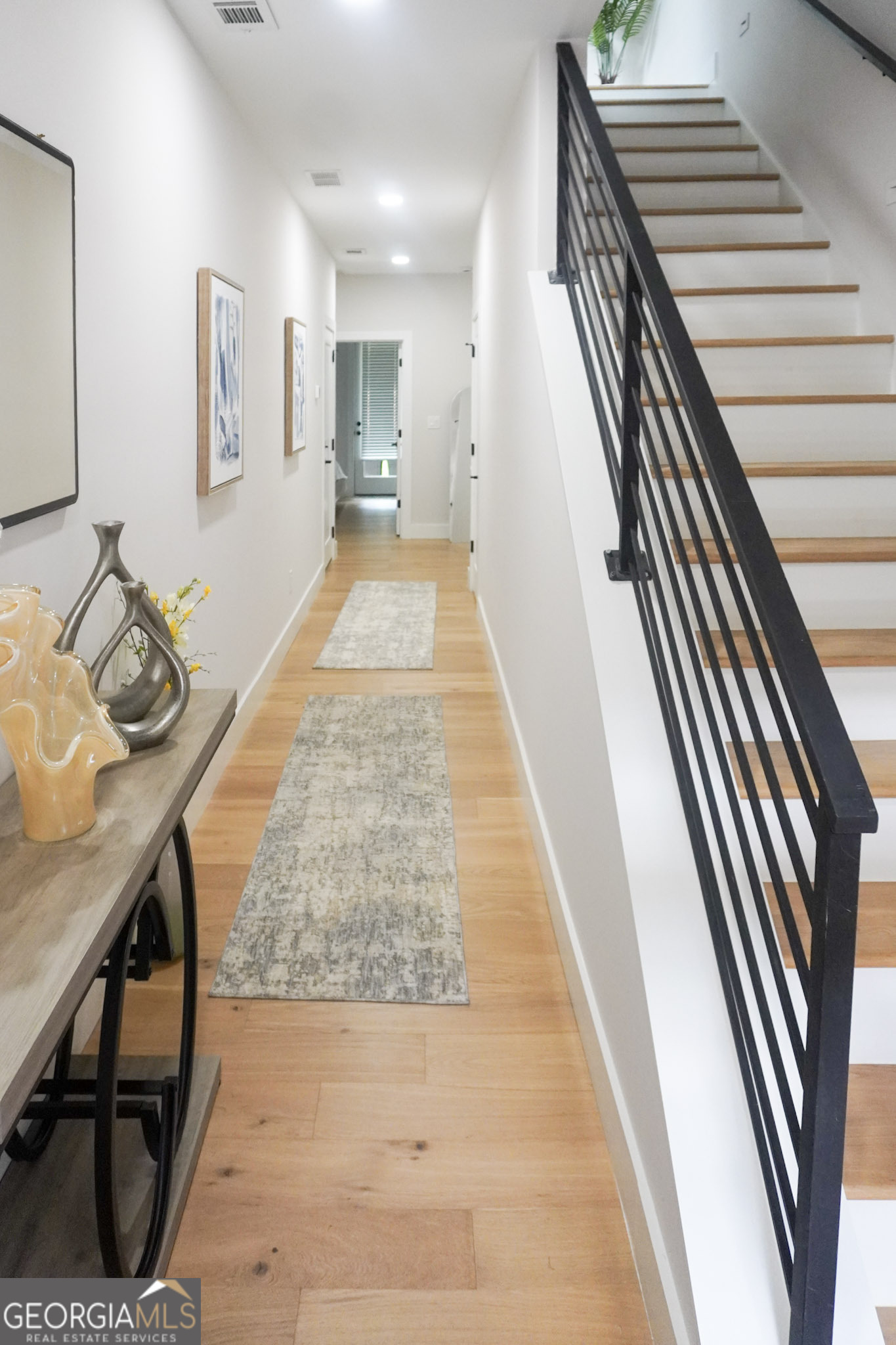 68 Boulevard Southeast Atlanta, GA 30312 - Photo 43 of 51 a view of a hallway with furniture and wooden floor