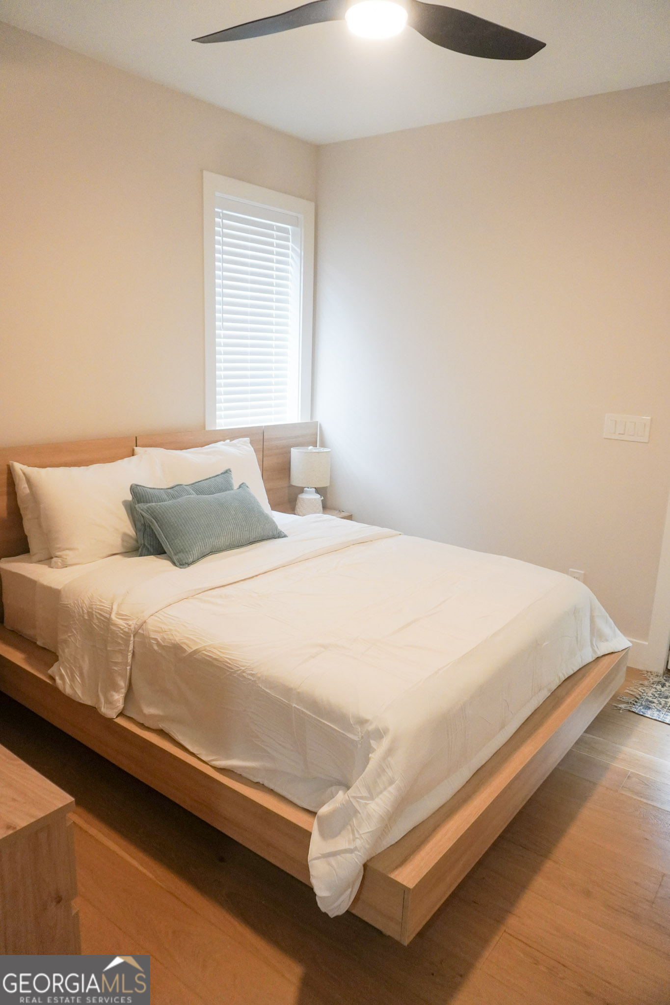 68 Boulevard Southeast Atlanta, GA 30312 - Photo 44 of 51 a bedroom with a bed and a night stand