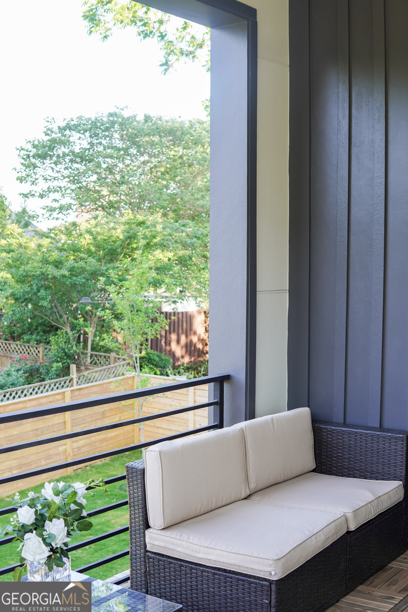 68 Boulevard Southeast Atlanta, GA 30312 - Photo 49 of 51 a view of a balcony with couches and wooden floor