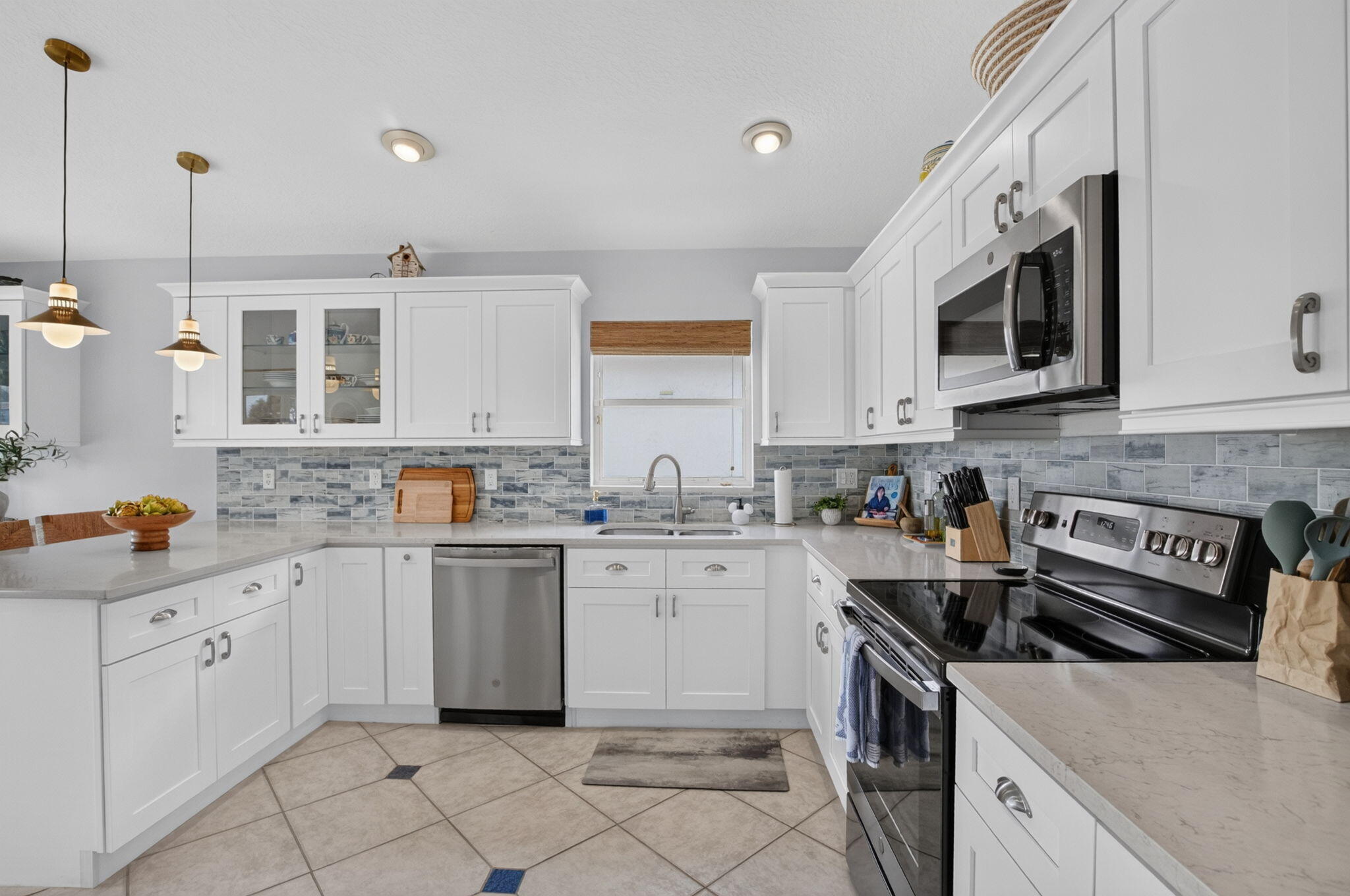 6746 Sun River Road Boynton Beach, FL 33437 - Photo 21 of 72 Lots of cabinets and counter space