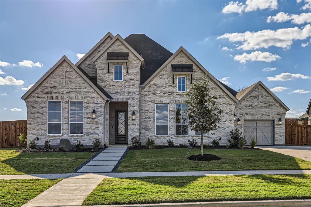 1812 Farmstead Road Mansfield, TX 76063 - Photo 1 of 1 View of front of property with a front yard and a garage