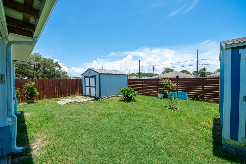 104 Sandollar Circle Fulton, TX 78382 - Photo 20 of 24 a view of a backyard with wooden fence