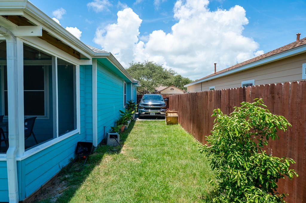 104 Sandollar Circle Fulton, TX 78382 - Photo 23 of 24 a backyard of a house with lots of green space