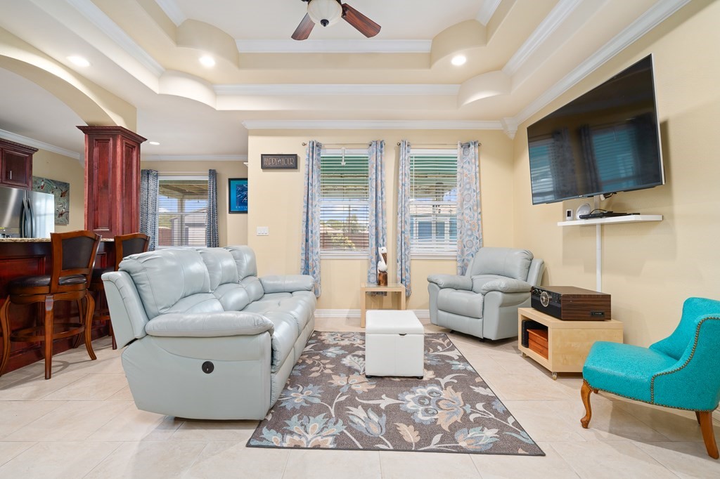 104 Sandollar Circle Fulton, TX 78382 - Photo 3 of 24 a living room with furniture and a flat screen tv