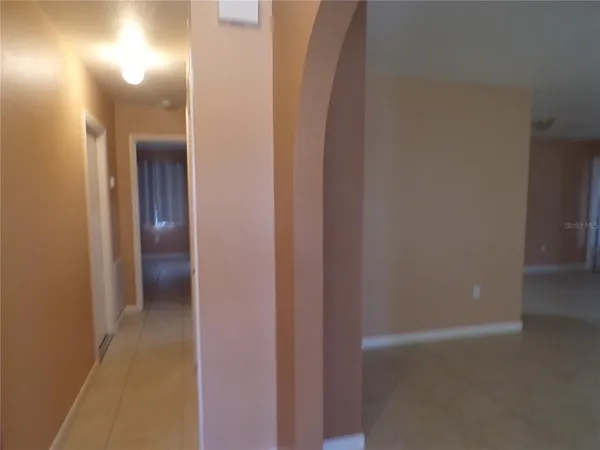 a view of a room that has a large window