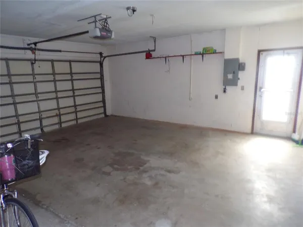 a front view of a house with a garage