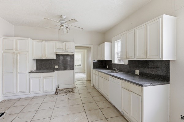 1655 Hawthorne Street Houston, TX 77006 - Photo 9 of 39 a kitchen with stainless steel appliances a stove a sink and a microwave