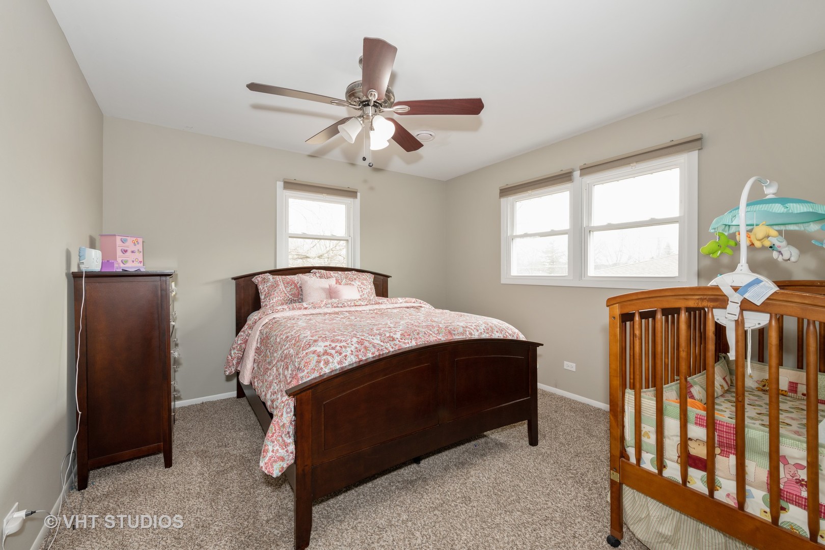 29-w021 Wagner Road Naperville, IL 60564 - Photo 8 of 12 a bedroom with a bed and a window