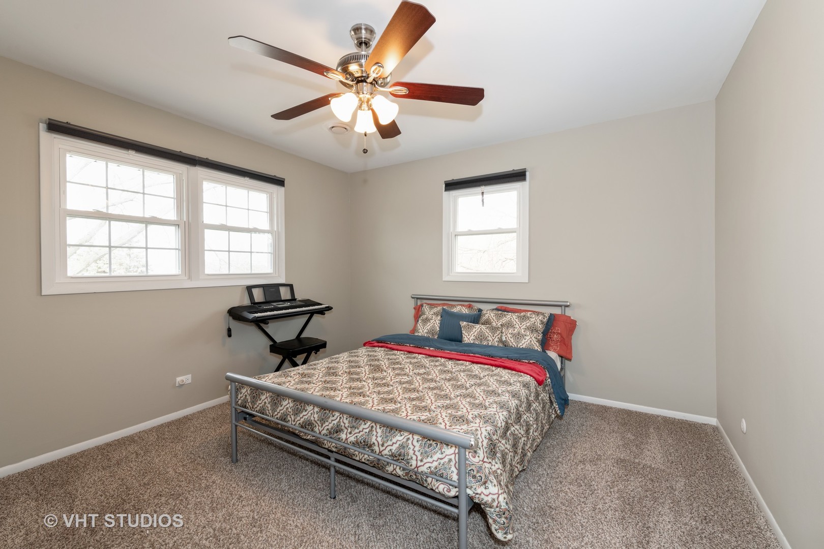 29-w021 Wagner Road Naperville, IL 60564 - Photo 9 of 12 a bedroom with a bed and a window