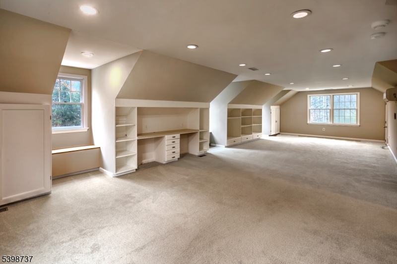 36 Calais Road Mendham, NJ 07945 - Photo 18 of 30 a view of empty room with a fireplace and windows