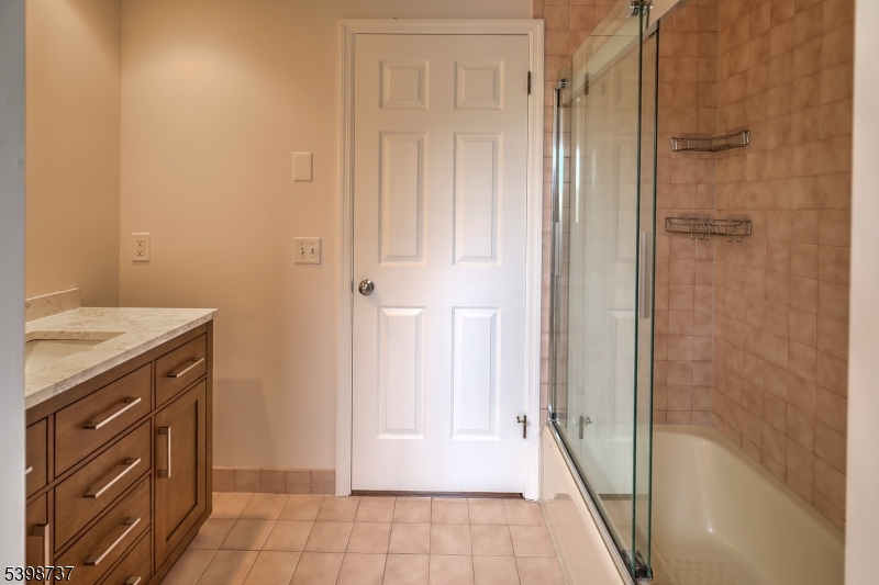 36 Calais Road Mendham, NJ 07945 - Photo 29 of 30 a bathroom with a shower and a sink