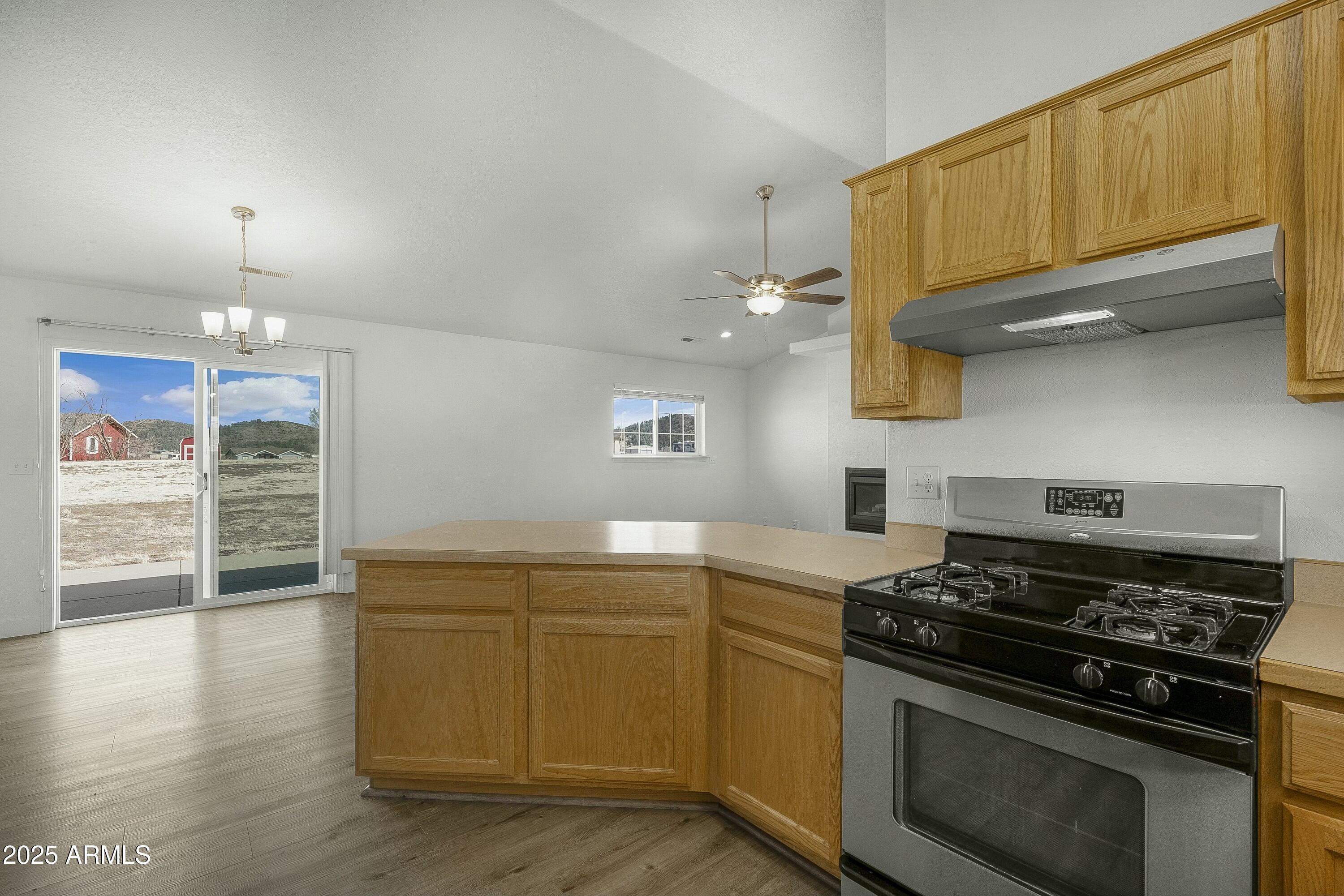 8080 Wendy's Way Flagstaff, AZ 86004 - Photo 6 of 18 a kitchen with a stove and a sink