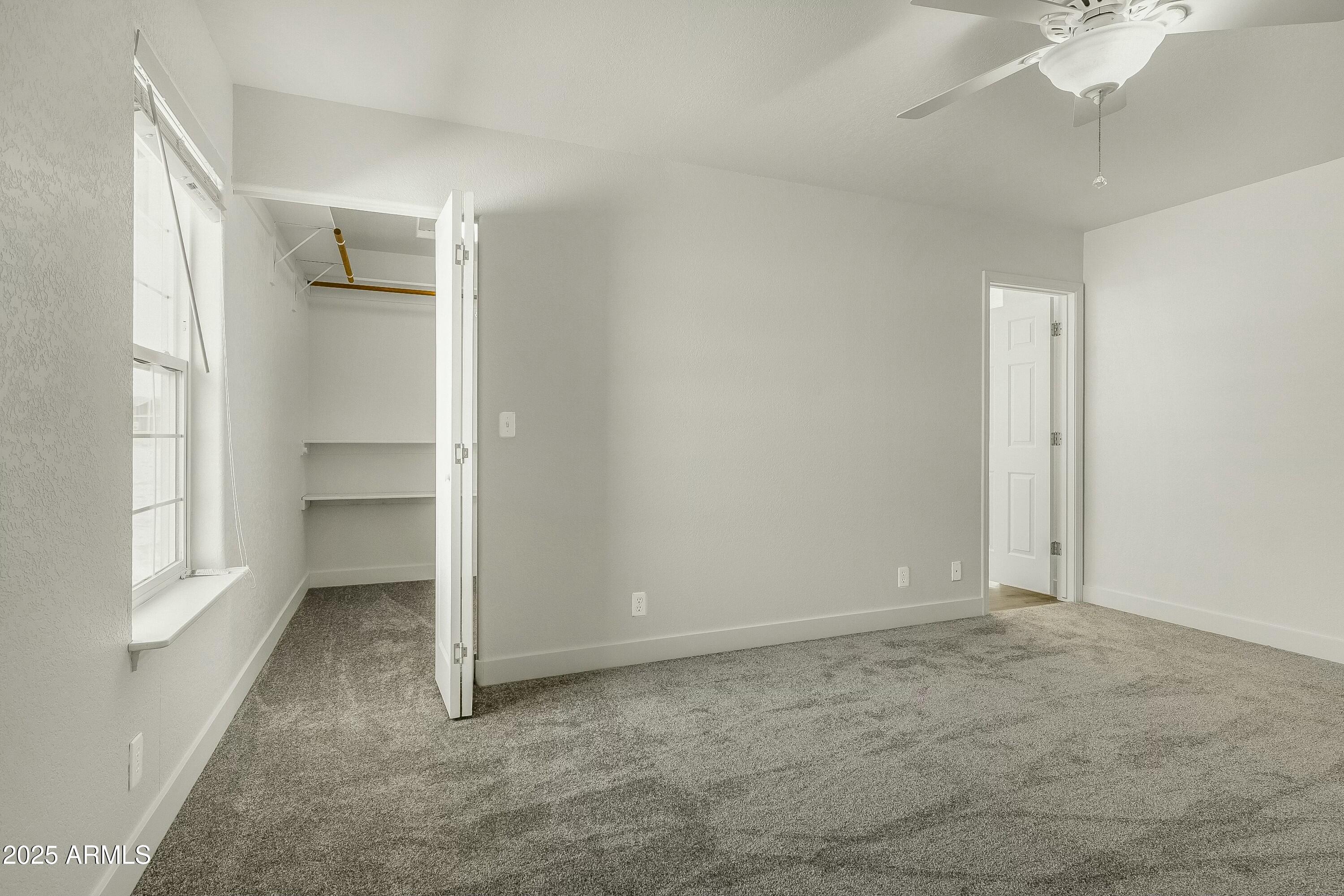 8080 Wendy's Way Flagstaff, AZ 86004 - Photo 7 of 18 a view of an empty room with a window