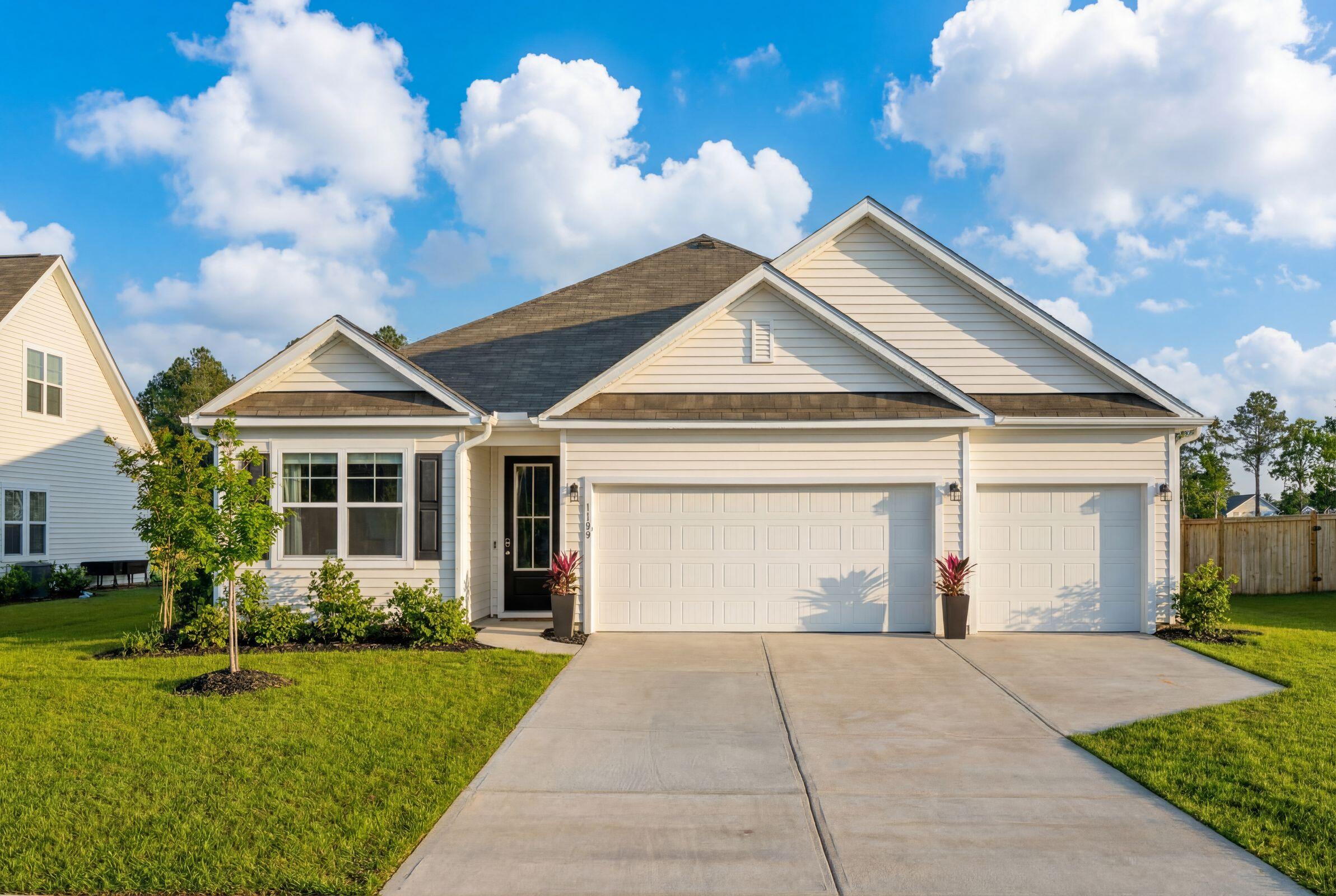 1199 Wading Pt Boulevard Huger, SC 29450 - Photo 1 of 33 1199WadingPtBlvd-KeenEyeMarketing-001