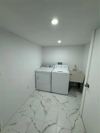 a utility room with a washer and dryer
